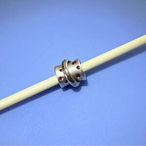 Chamilia sterling silver retired Stella bead with pink CZ stones.